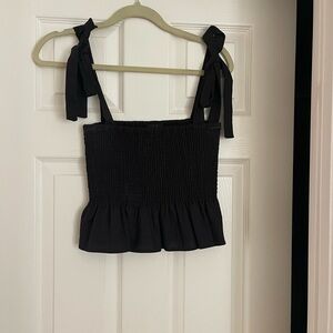 Kourt baby doll top with tie shoulders. Size M